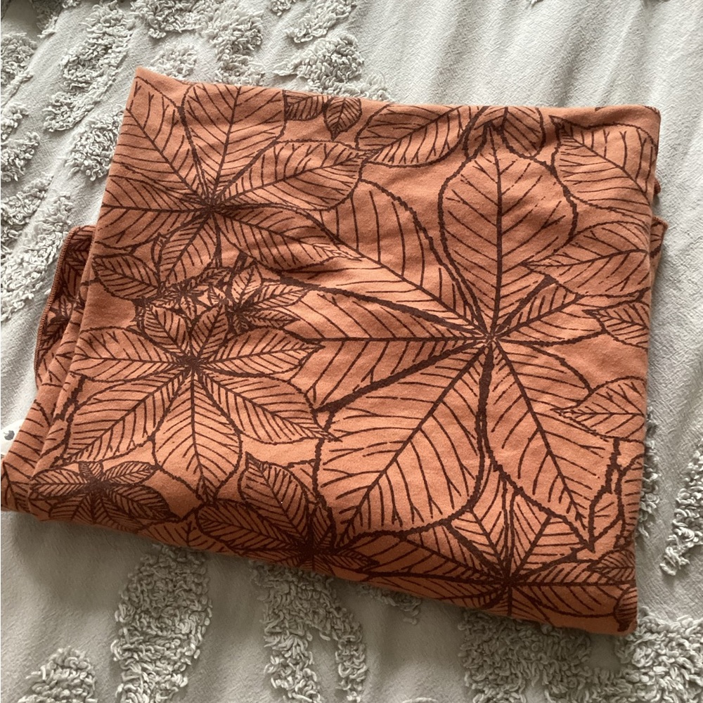Kate Quinn organic cotton brown foliage swaddle blanket